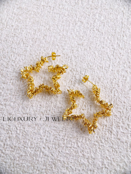 Star shaped gold plated earring