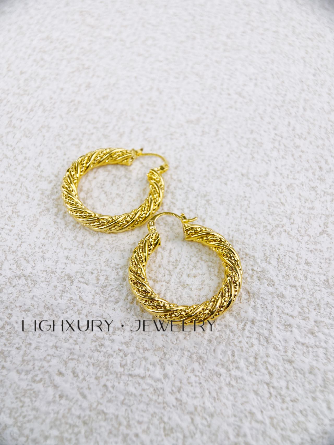 Twisty hoop gold plated earring