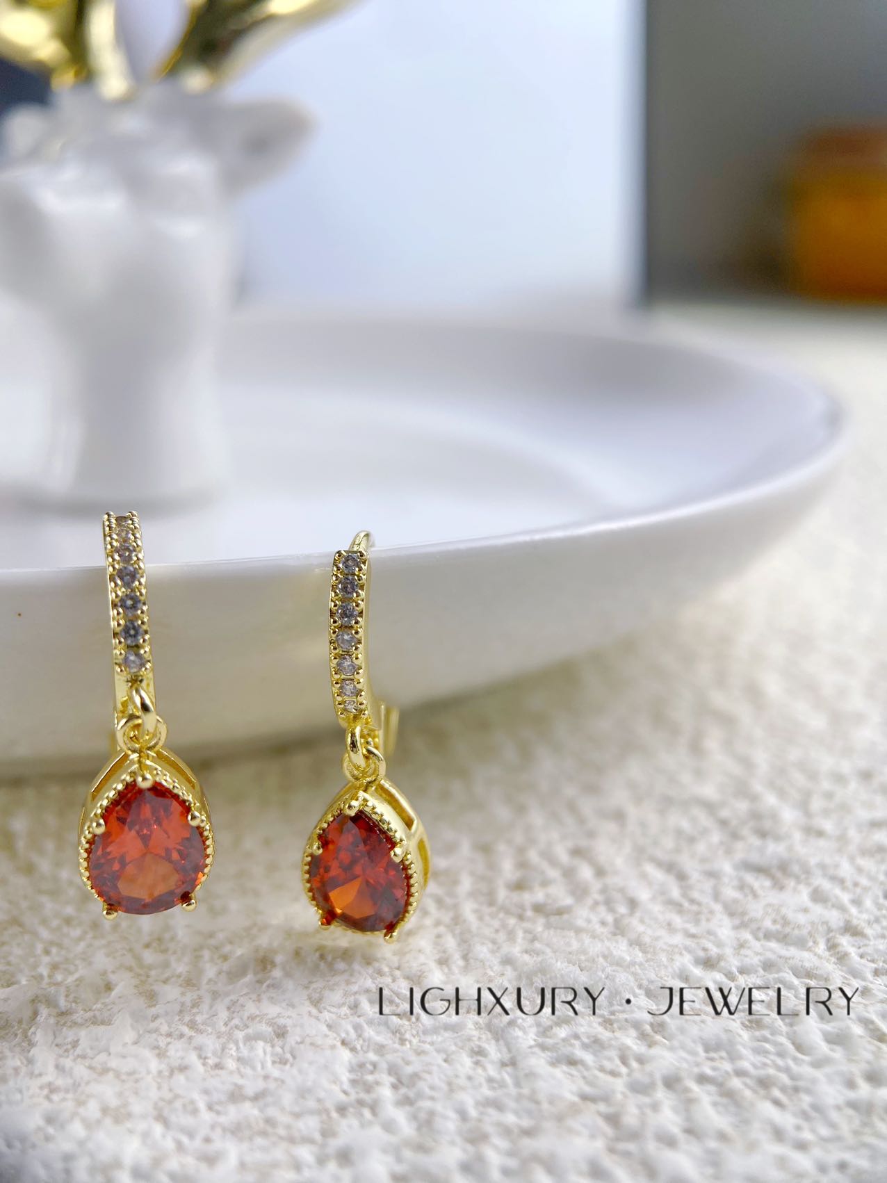 Amber colour crystal gold plated earring