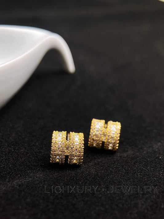 Golden H-Shaped Earrings: A Stylish and Sparkling Statement