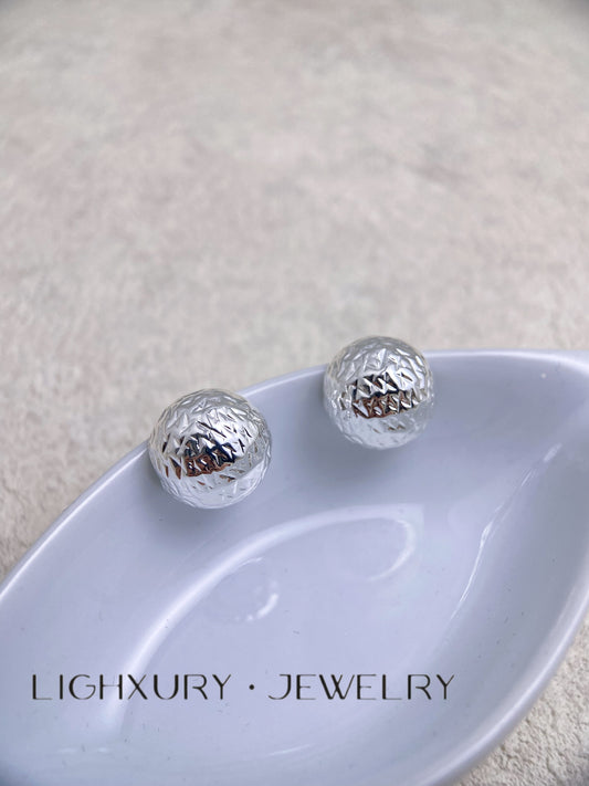 Platinum-Plated Textured Sphere Earrings: A Sleek and Captivating