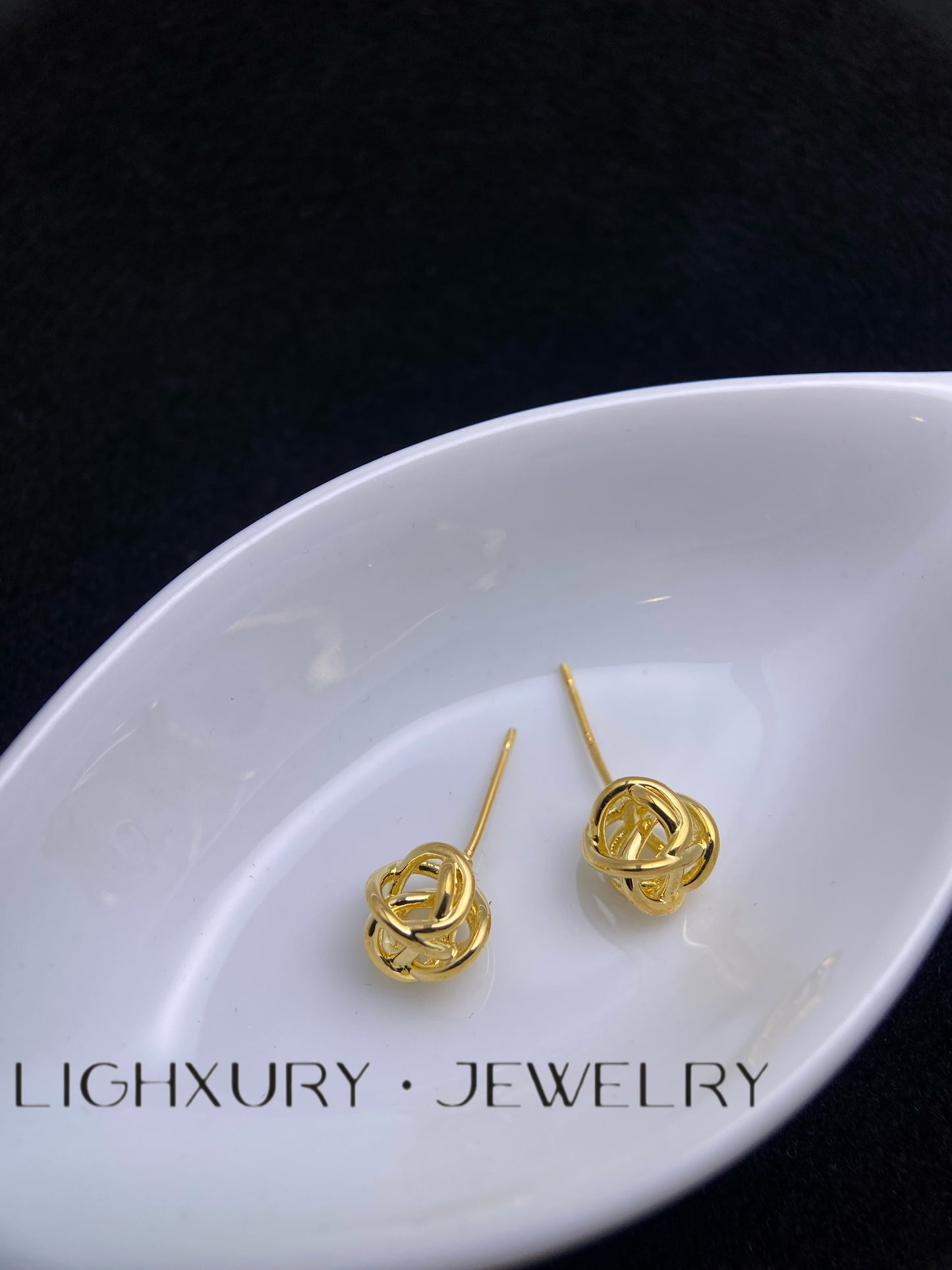 Golden Endless Twist Earrings: A Symbol of Timeless Elegance