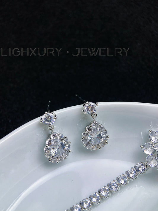 Platinum-Plated Teardrop and Round Zircon Earrings: A Captivating Display of Brilliance