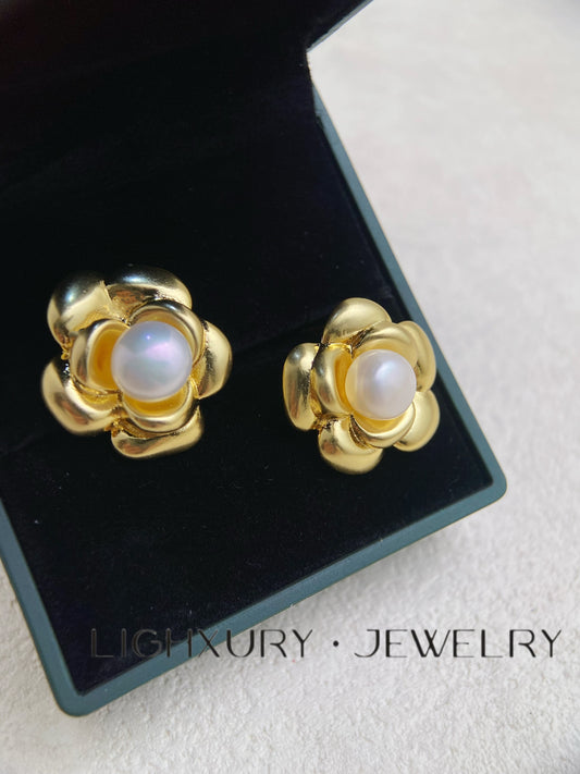 Golden Flower Earrings with a White Pearl Center: A Timeless Elegance